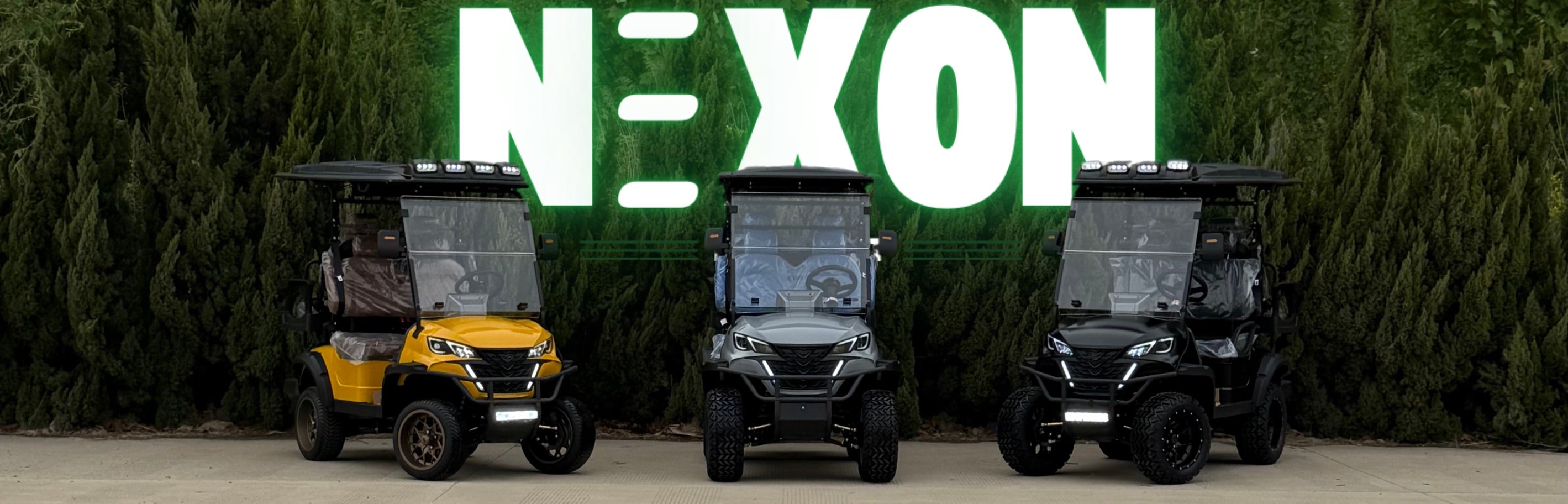 Three Nexon EV carts side by side